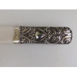 A Victorian letter opener/page turner with embossed silver handle and ivory blade L&S, Birmingham