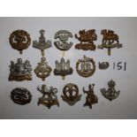 15 various infantry cap badges - including WWI.