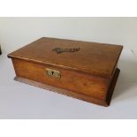 An oak cigar box, 11" across.
