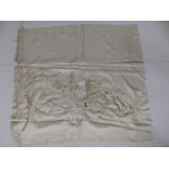 A Chinese cream silk embroidered dragon panel, 29" x 28" overall.