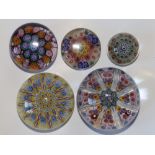 A Strathern millefiori glass paperweight, 3", a Perthshire weight and three other smaller millefiori