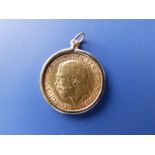 A 1913 half sovereign in pendant mount.
