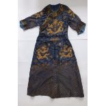 A late 19thC Chinese Imperial Court blue embroidered gauze summer robe, decorated in yellow/gold