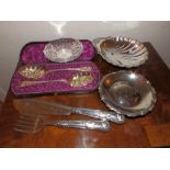 A cased pair of EP berry spoons, a pair of fish servers and two other pieces. (6)