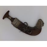 An antique Arabian jambya dagger in sheath, 13" overal - hilt repaired.