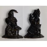 A pair of cast iron Punch & Judy doorstops - later spray painted, 11.5" high.