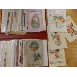 A small collection of Mabel Lucy Atwell and other postcards in a modern album.