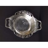 A Liberty & Co silvered 'English Pewter' two-handled dish in pattern No. 0287, 11" across.