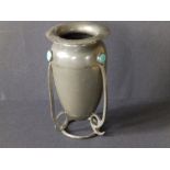 A small art noveau pewter vase by Connells of Cheapside, the shoulders applied with three