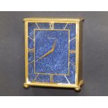 A Jaeger LeCoultre brass cased mantel clock, the rectangular dial in lapis lazuli finish, manual