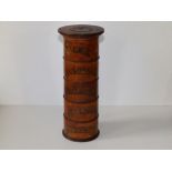 A 19thC cylindrical wooden spice tower - 'Mace, Cloves, Ginger, Nutmeg & Cinammon', 10.5" high