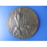 A WWI bronze death plaque awarded to 240512 Lance Coropral John Lovatt Knight, Sherwood Foresters