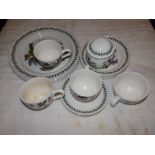 35 pieces of Nautilus Porcelain tea ware decorated poppies with gilt rims.