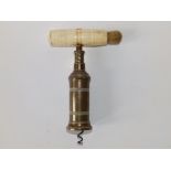 A 19thC brass barrel corkscrew of Thomason type with bone handle & brush.