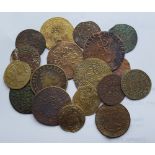 A quantity of antique brass jetons and tokens.