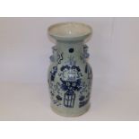 An antique Chinese blue & white porcelain , the flared rim above shouldered body applied with two