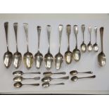 A lace back silver table spoon - CM, London 1747, 8", a pair of table spoons - London 1791, 8.8" and