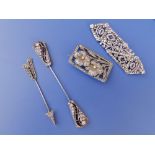 A marcasite jabot and three other pieces of marcasite jewellery. (4)