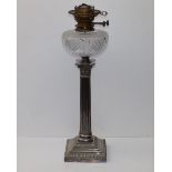 A Victorian oil lamp by Hicks & Sons with cut glass reservoir on EP Corinthian column standard by