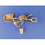 A 'South Africa' gold miner's '9ct' sweetheart brooch with shovel & bucket swing, 1.75".