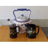 A large 'Victoria' ironstone tea kettle together with two black glazed pieces. (3)