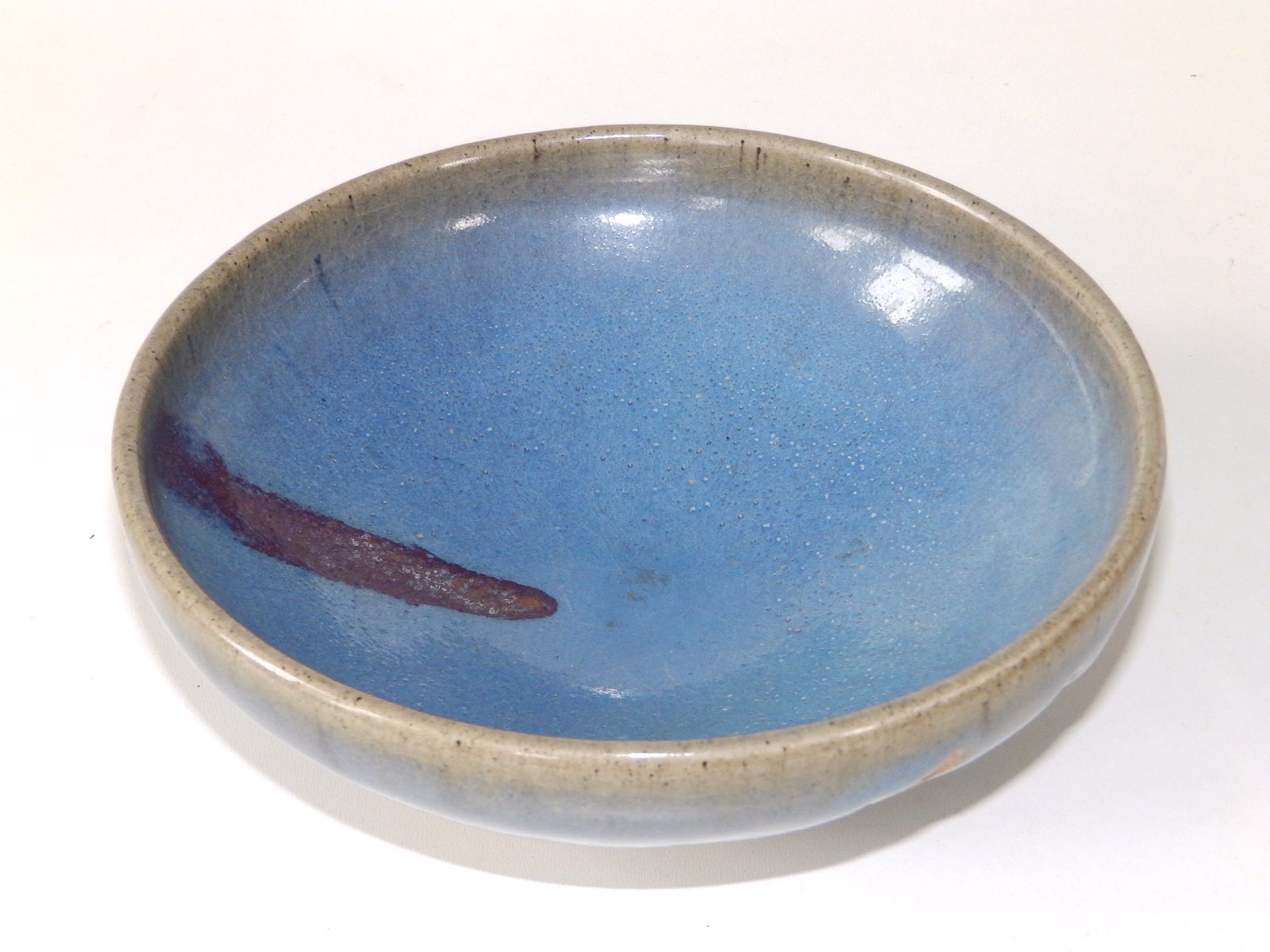 A Chinese blue glazed Jun ware bowl, thickly potted, 7" diameter - possibly Yuan Dynasty. From a