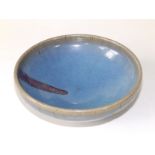 A Chinese blue glazed Jun ware bowl, thickly potted, 7" diameter - possibly Yuan Dynasty. From a