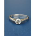 A diamond solitaire ring, the collet set brilliant cut stone weighing approximately 0.55 carat in