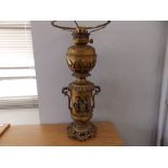 A 19thC continental gilt metal oil lamp, 22".