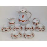 A Meissen porcelain 15 piece coffee set in Red Court Dragon pattern, having iron red decoration with