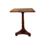 A 19thC mahogany pedestal occasional table with rectangular top on triform base, 20" across.