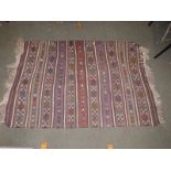 A late 19th/early 20thC kelim, possibly Turkish, 57" x 85" together with a kelim runner which has