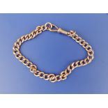 A 9ct gold curb link bracelet made from a watch chain, 8".