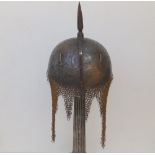 A 19thC Indo-Persian steel kulah-khud helmet, having a square section spike, overall finely engraved