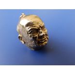 A 9ct gold Winston Churchill head pendant - J Ld., London., 0.8" high.