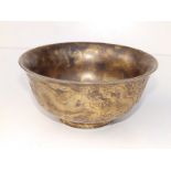 A Chinese porcelain bowl with gold sponged decoration overall, the exterior bearing relief