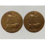 A pair of WWI bronze death plaques dedicated to Sjt. William John Gollop, Devon Regt. Died 31.07.