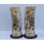 A pair of Japanese Meiji period shibayama ivory tusk vases, the sides decorated to show cranes and