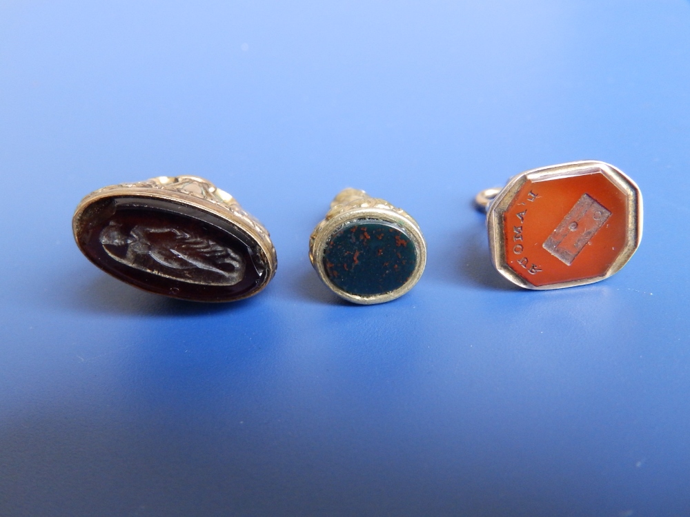 Three antique seal fob pendants, the largest 1.1" high having chips to the obsidian stone. - Image 6 of 6