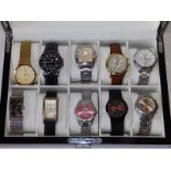 A collection of 10 gent's quartz movement wrist watches in a glazed display case; Accurist,