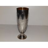 A Russian art nouveau silver pedestal vase with engraved decoration including an inscription and art