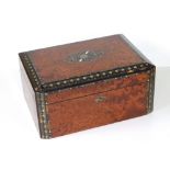 A Victorian amboyna veneered sewing box, 11.25" across.