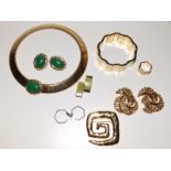 A Monet gilt metal choker with green cabochon and matching earrings, a Swatch bracelet and ring, two