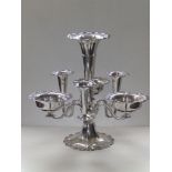 An early 20thC Mappin & Webb silver epergne, the central trumpet flute above six scrolling branches,