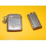 A small Edwardian plain silver pendant vesta case of chamfered rectangular form - PP Ld, Chester
