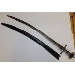 A 19thC Indian tulwar sword in scabbard, impressed marks to blade '1/1 37S 93', believed to have