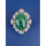 A cabochon emerald & diamond set 18ct white gold ring, the elaborately pierced openwork claw