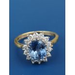 A modern oval Ceylon sapphire & diamond ring, the sapphire weighing approximately 4 carats, on