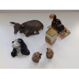 A pair of Beswick koalas, a Sylvac dog wall mask, two pieces of Royal Doulton and a damaged deer