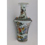 A Chinese famille verte porcelain bottle vase, the angular shoulders moulded with lion mask ring